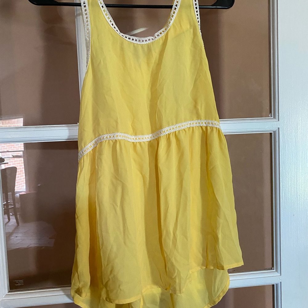 Slightly high low flowing top